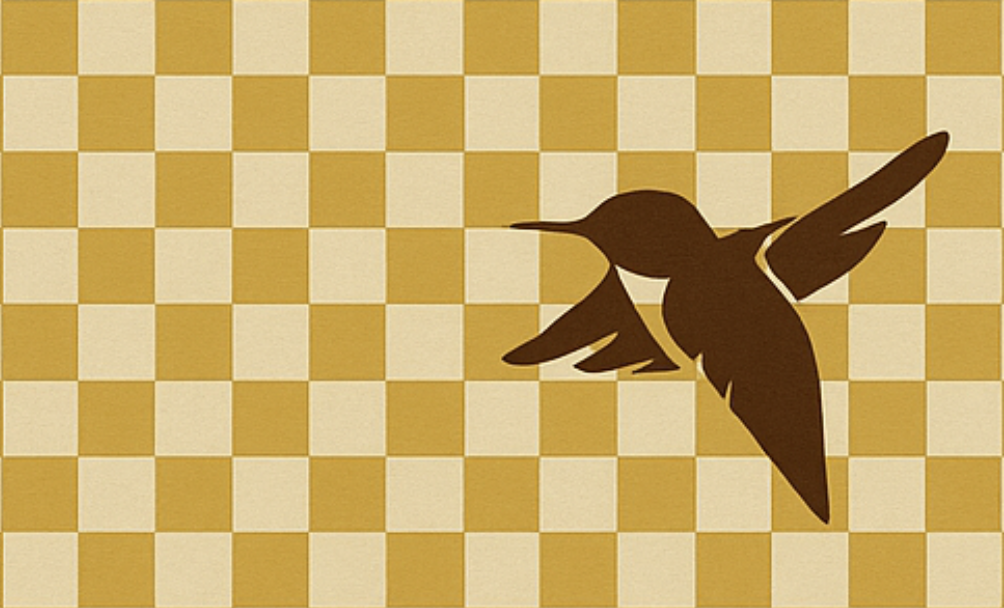 Cafe K Streets hummingbird on a yellow and cream checkerboard